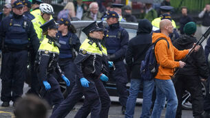 <p>Members of the Garda and the Garda Public Order Unit outside Leinster House, Dublin, as the Dáil resumesd.</p>