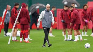 <p>RED MAN WALKING: Manchester United manager Erik ten Hag during a training session at Carrington, Manchester. Pic: Martin Rickett/PA Wire</p>