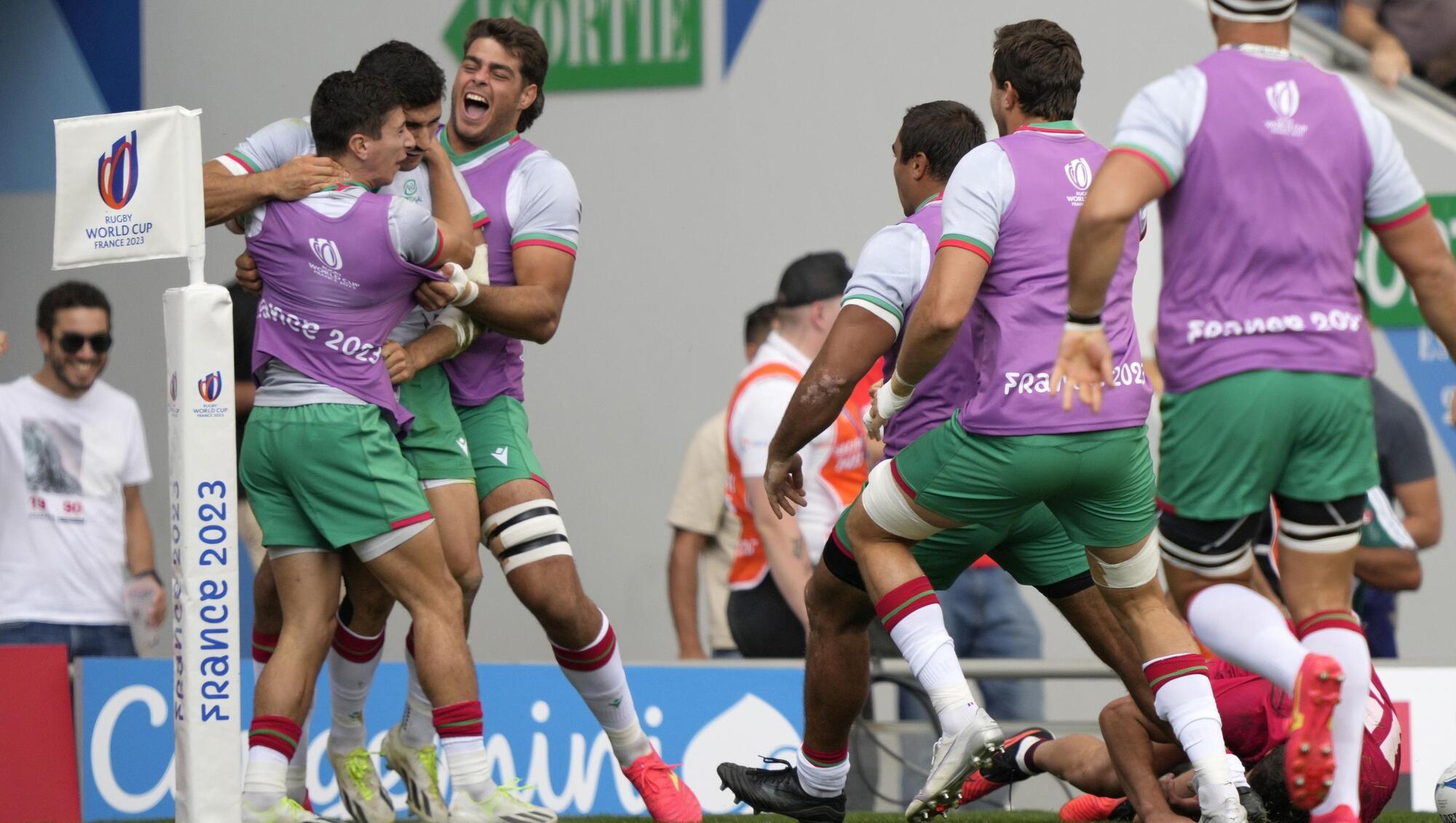 SWEET RELIEF: Portugal's Raffaele Storti celebrates with teammates after scoring a try during the Rugby World Cup Pool C match between Georgia and Portugal at the Stadium de Toulouse in Toulouse, France, Saturday, Sept. 23, 2023. Pic: AP Photo/Lewis Joly