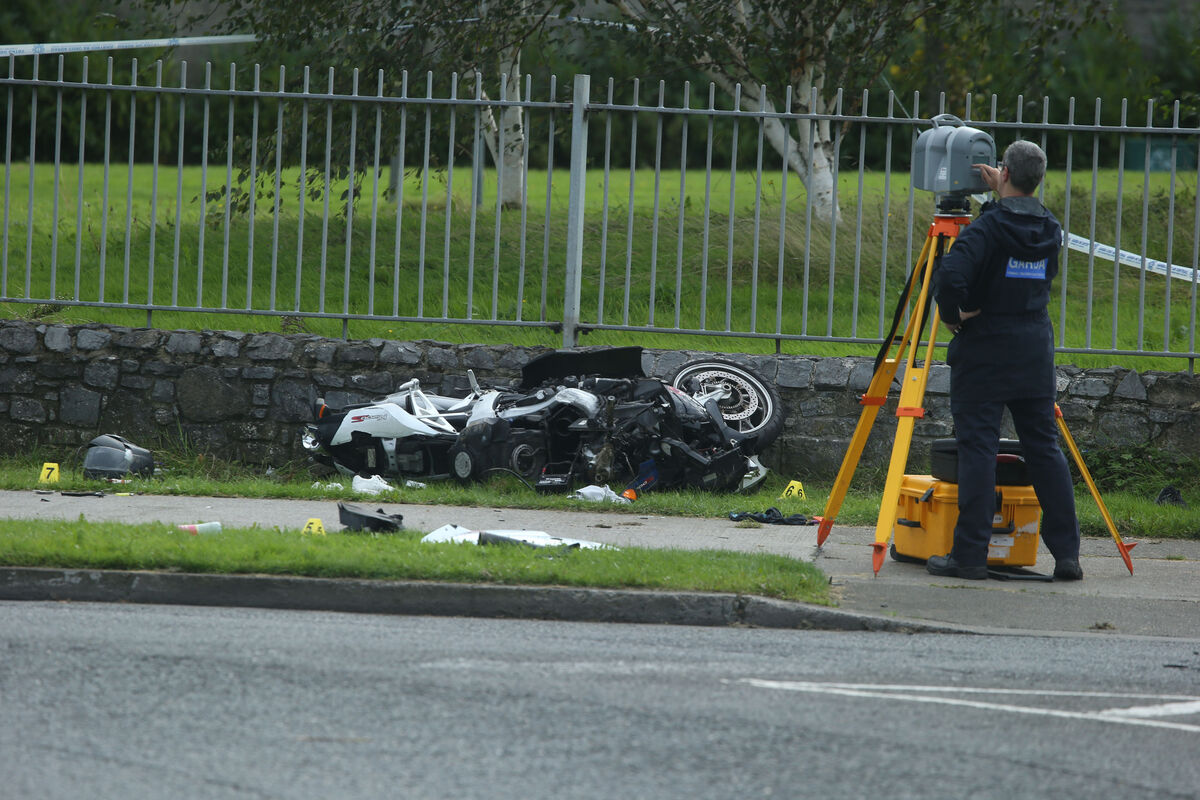 The scene of a collision, involving a motorcycle and a pedestrian occurred at a roundabout on Whitestown Way. Picture: Stephen Collins/Collins Photos The scene of a collision, involving a motorcycle and a pedestrian occurred at a roundabout on Whitestown Way. Picture: Stephen Collins/Collins Photos