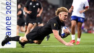 <p>EASY DOES IT: New Zealand's Damian McKenzie scores his side's third try of the game against Namibia at the Stade de Toulouse. Pic: PA</p>