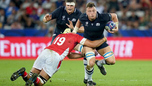 <p>BREAKING THROUGH: Scotland's Jack Dempsey is tackled by Tonga's Adam Coleman at the Stade de Nice. Picture: Adam Davy/PA Wire.</p>