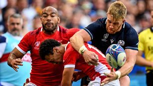<p>MAN AND BALL: Scotland's Kyle Steyn battles for possession in Nice with Tonga's Afusia Taumoepau and Sam Lousi. </p>