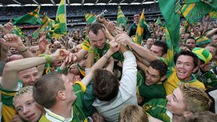 <p>BYGONE ERA: Tuesday is the anniversary of Kerry’s 2004 All-Ireland win. Seamus Moynihan is mobbed by fans on the pitch after the game.<br>The days of measuring our years by September finals are gone. Pic: INPHO/Billy Stickland</p>