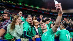 <p class="contextmenu internal_Caption">FAMILY AFFAIR: Ireland’s Jack Crowley takes a selfie with his father Fachtna, mother Maria, and sister Tessa after the game. Pic: INPHO/Dan Sheridan</p>
