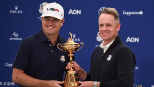 <p>ALL SMILES: European Ryder Cup captain Luke Donald (right) and US Ryder Cup captain Zach Johnson pose with the Ryder Cup after a press conference at Marco Simone Golf Club in Rome. Pic: Cian O'Regan</p>