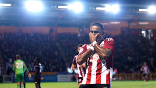 Exeter’s Demetri Mitchell celebrates his winner against Luton (Andrew Matthews/PA).