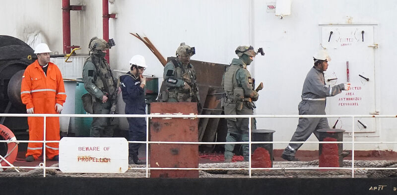 Military personnel onboard a cargo vessel named MV Matthew whilst it's escorted into Cobh in Cork by the Irish Navy after a "significant quantity" of suspected drugs were found onboard. Three men have been arrested on suspicion of organised crime offences. Picture: Niall Carson/PA Wire Military personnel onboard a cargo vessel named MV Matthew whilst it's escorted into Cobh in Cork by the Irish Navy after a "significant quantity" of suspected drugs were found onboard. Three men have been arrested on suspicion of organised crime offences. Picture: Niall Carson/PA Wire