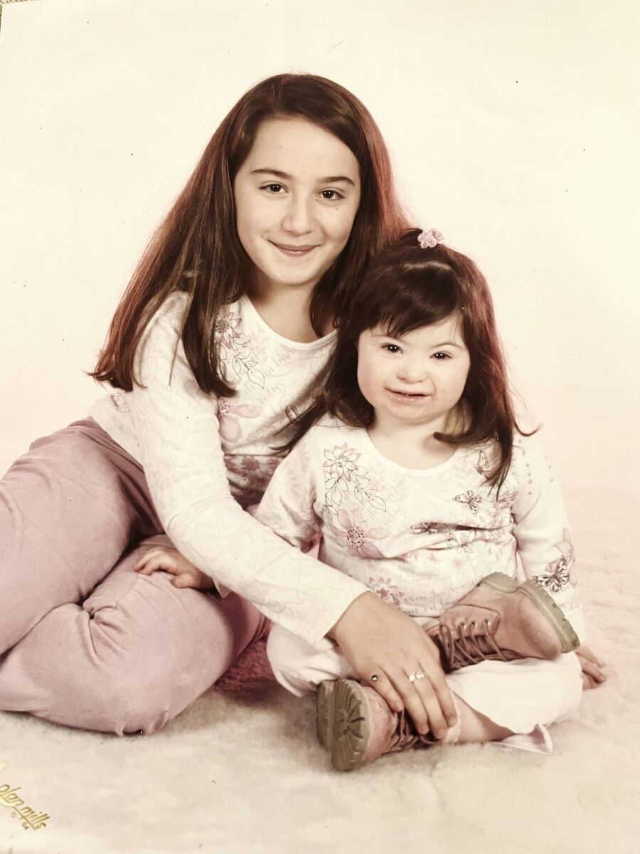 Ellie with her sister, Amy