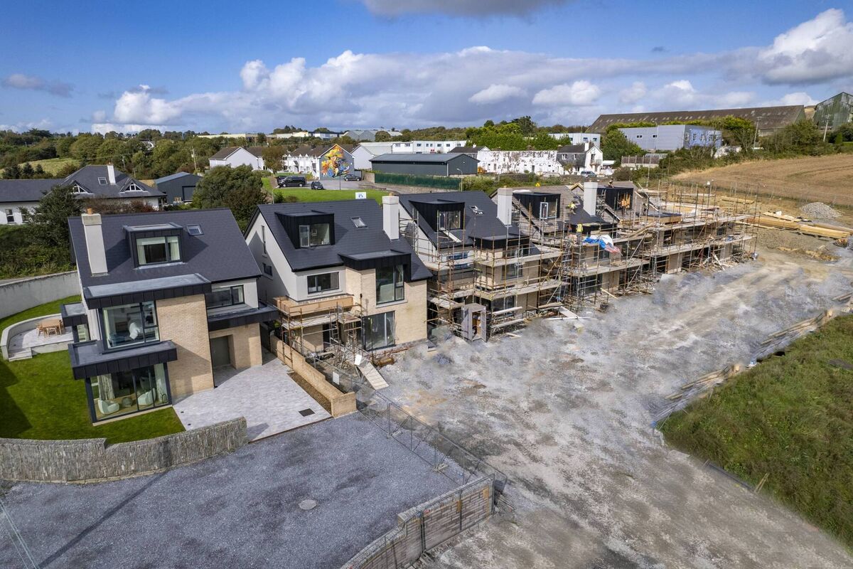 Watersland under construction with builders CETTI: the A1 type is on the left. The other five are A2 types, slightly smaller without the feature corner window. Pic Jakub Walutek Watersland under construction with builders CETTI: the A1 type is on the left. The other five are A2 types, slightly smaller without the feature corner window. Pic Jakub Walutek
