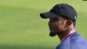 <p>Cameroon's Football Federation president and former player Samuel Eto'O fils attends a training session on November 27, 2022 at the Al Sailiya SC in Doha on the eve of a Qatar 2022 World Cup football match between Cameroon and Serbia. (Photo by ISSOUF SANOGO / AFP) (Photo by ISSOUF SANOGO/AFP via Getty Images)</p>