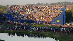 <p>FIRST TEE: Team Europe's Jon Rahm, Team Europe's Tyrell Hatton, USA's Scottie Scheffler and USA's Sam Burns walk from the 1st tee during the Foursomes on day one of the 44th Ryder Cup at the Marco Simone Golf and Country Club, Rome, Italy, ahead of the 2023 Ryder Cup. </p>