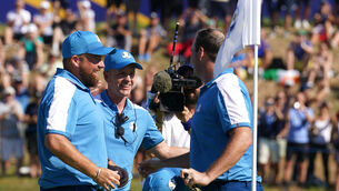 <p>DAY ONE COMPLETE: Team Europe's Shane Lowry and Sepp Straka celebrate winning their foursomes match with Team Europe Captain Luke Donald. </p>