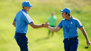 <p>Team Europe's Ludvig Aberg and Viktor Hovland celebrate on the 14th green. Pic: Mike Egerton/PA Wire.</p>