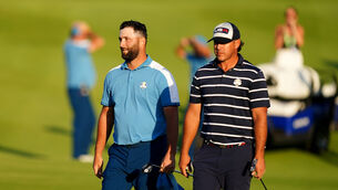 <p>Jon Rahm, left, has played down Brooks Koepka’s criticism of his behaviour at the Ryder Cup. Pic: Mike Egerton/PA</p>