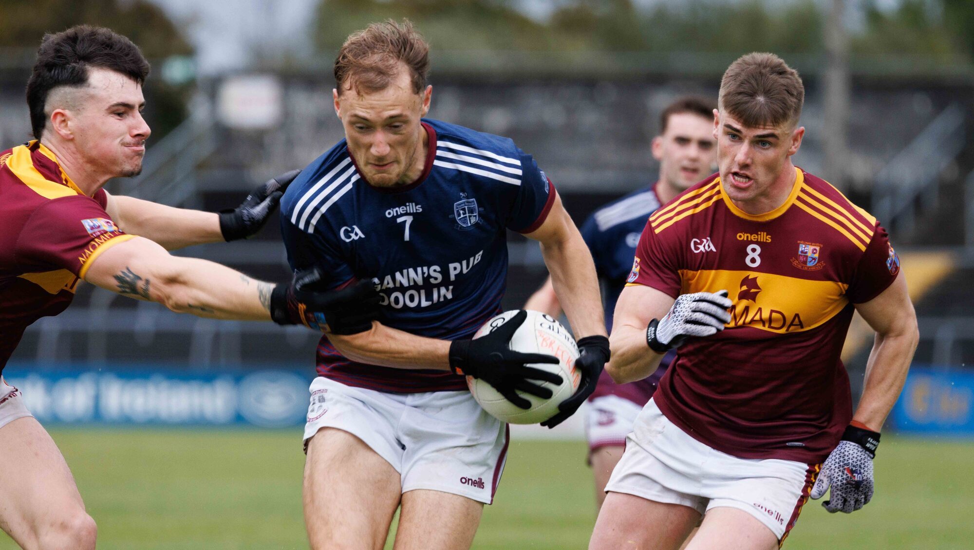  FINAL BOUND: St Breckan's Jack Sheedy and St Josephs Milltown Malbay's Cian O'Mahoney and Oisin Looney in action. Pic: Eamon Ward