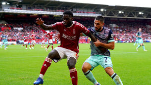 <p>Nottingham Forest's Orel Mangala (left) and Brentford's Neal Maupay battle for the ball. Pic: Nick Potts/PA Wire</p>