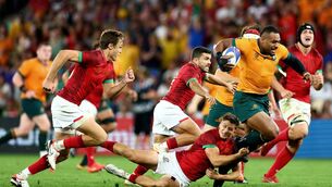 <p>Samu Kerevi of Australia is tackled by Rodrigo Marta of Portugal in Saint-Etienne. Picture: Chris Hyde/Getty Images</p>
