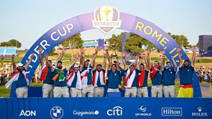 <p>WINNING FEELING: Team Europe captain Luke Donald, centre, lifts the Ryder cup with his team, from left, Tommy Fleetwood, Sepp Straka, Shane Lowry, Matt Fitzpatrick, Justin Rose, Tyrrell Hatton, Nicolai Højgaard, Rory McIlroy, Viktor Hovland, Ludvig Åberg, Robert MacIntyre and Jon Rahm. Pic: Ramsey Cardy/Sportsfile</p>