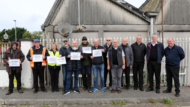 <p>Limerick Bus Éireann drivers outside the main depot. Picture: Brendan Gleeson</p>