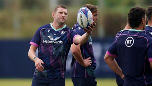 <p>READY FOR BATTLE: Scotland's Finn Russell during a training session at the Stade des Arboras in Nice, France. Pic: PA</p>