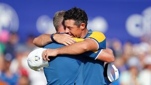 <p>job done: Europe's Rory McIlroy with captain Luke Donald following his Sunday singles win.</p>