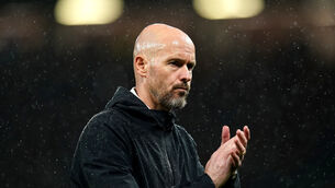 <p>UNITED WE STAND: Erik ten Hag applauds the Manchester United fans following defeat to Galatasaray. Pic: Martin Rickett/PA</p>