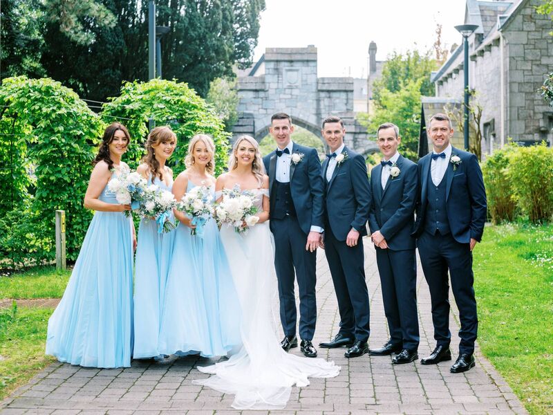 Laura O’Keeffe and Colin Lyons with their wedding party.
