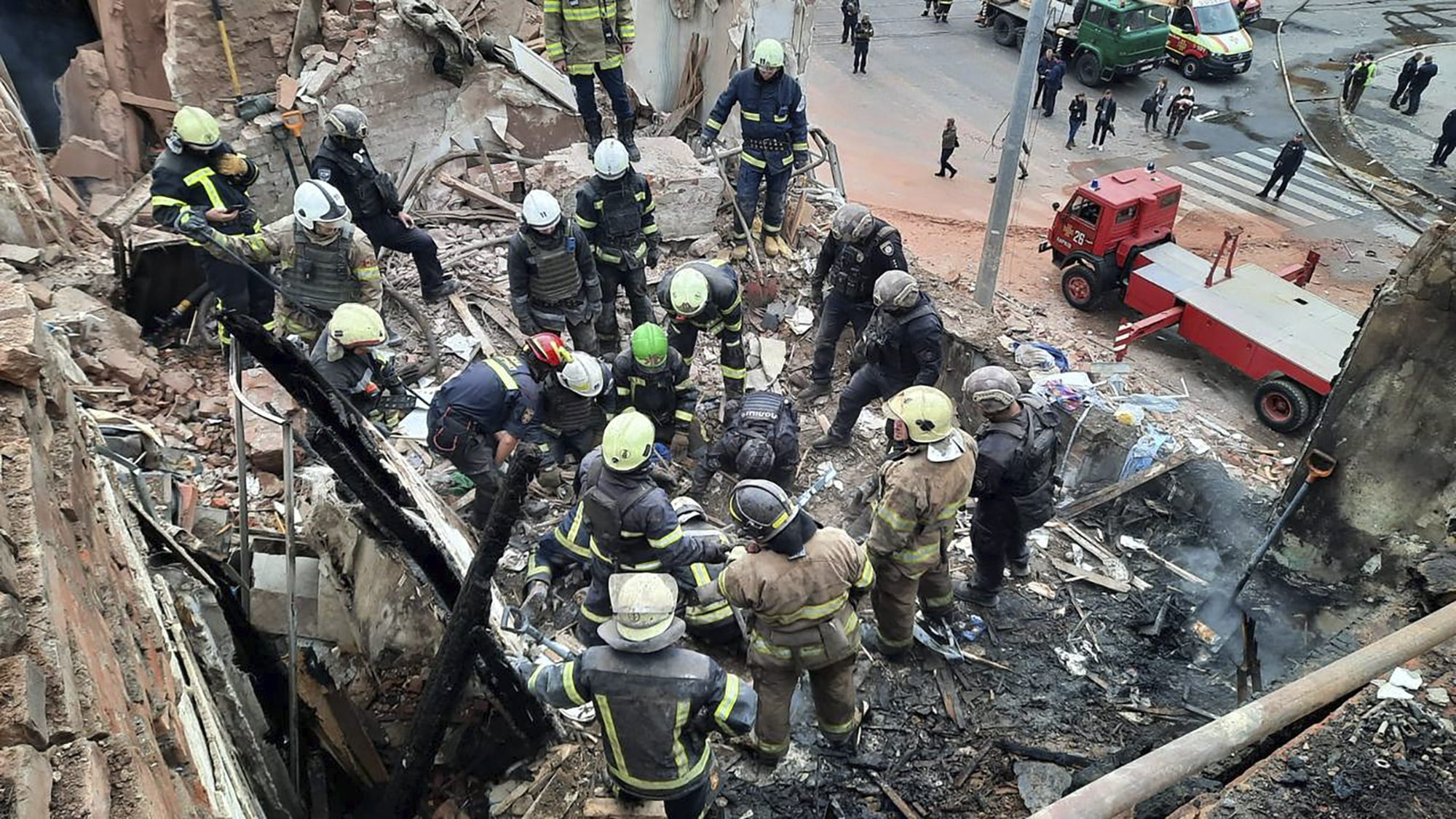 Rocket Rescuers Boy aged 10 dead and dozens hurt as Russian rocket strikes Kharkiv