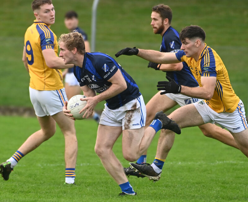 Bantry Blues' Ruairi Deane breaks from Kilshannig's Colm O'Shea during the Bon Secours Cork PIFC semi final at Coachford. Picture; Eddie O'Hare
