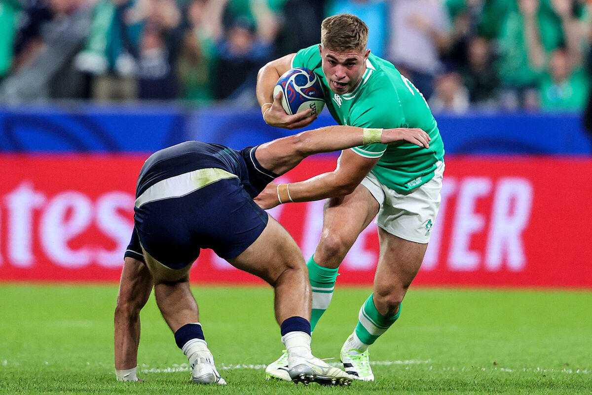 SIDESTEP: Ireland's Jack Crowley and Scotland's Huw Jones.