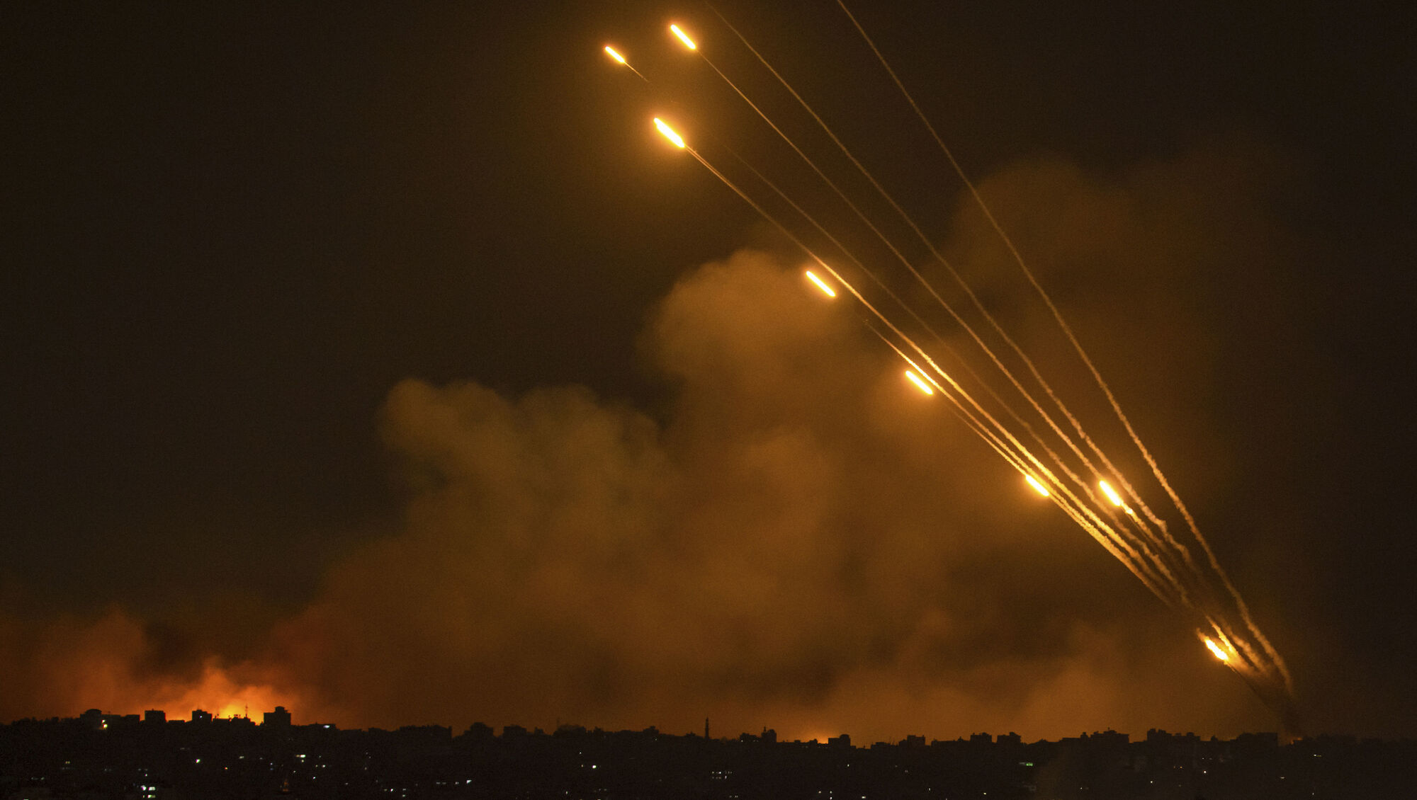 Israel pounds Gaza, battles Hamas raiders after bloody incursion