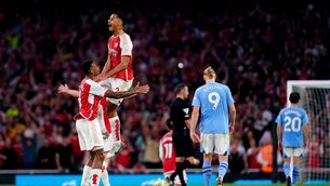 <p>RISING ABOVE: Arsenal's William Saliba and Gabriel celebrate.</p>