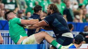 <p>FAIR PLAY?: Ireland's Dan Sheehan is pushed backwards over an advertising hoarding by Scotland's Pierre Schoeman as tempers flared in Saturday's encounter at the Stade de France. </p>