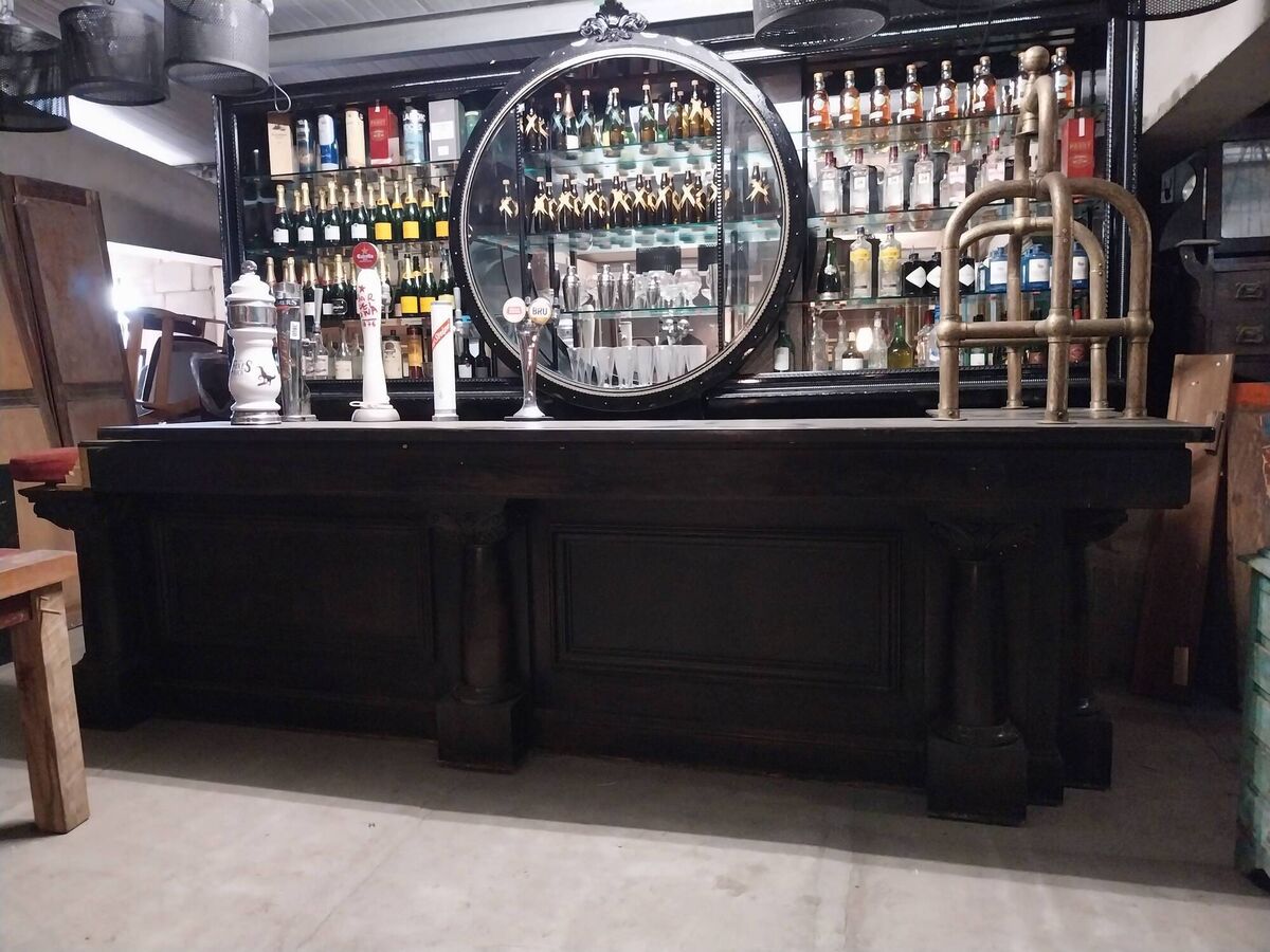 A Brunswick-style ebonised bar counter at Victor Mee. A Brunswick-style ebonised bar counter at Victor Mee.