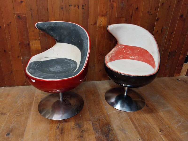A pair of chrome swivel chairs at Victor Mee. A pair of chrome swivel chairs at Victor Mee.