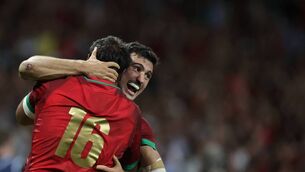 <p>Raffaele Storti David Costa celebrate Portugal's victory over Fiji in their Rugby World Cup Pool C match at the Stade de Toulouse. Pic: Valentine Chapuis/AFP via Getty Images</p>