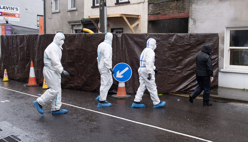 Gardaí and members of the forensic team go to a house in Youghal, Co Cork, where the search continues for the late Tina Satchwell. Picture: Dan Linehan Gardaí and members of the forensic team go to a house in Youghal, Co Cork, where the search continues for the late Tina Satchwell. Picture: Dan Linehan