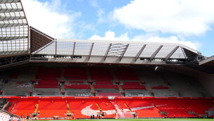 <p>DELAY: General view of the new upper Anfield Road stand under construction.</p>