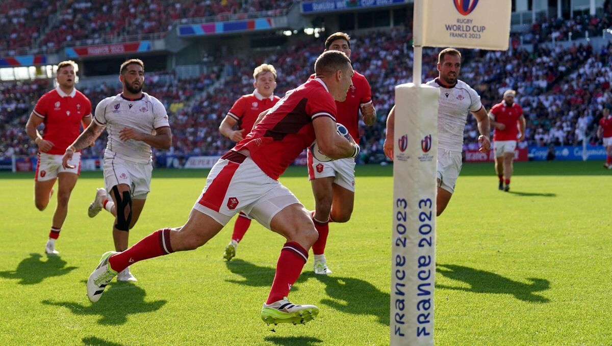 Wales' George North runs in to score his side's sixth try against Georgia. Wales' George North runs in to score his side's sixth try against Georgia.