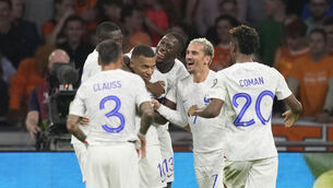 <p>STAR MAN: France's Kylian Mbappe, centre left, celebrates after scoring his side's second goal. Pic: AP Photo/Peter Dejong</p>