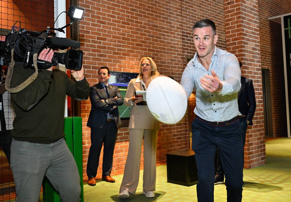 Jonathan Sexton tests his passing skills at the International Rugby Experience opening in May. Picture: Diarmuid Greene