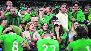 <p>THIS IS WHERE WE ARE: Josh Van der Flier, Garry Ringrose, and Caelan Doris were among the Ireland players consoled on the sideline by family members after being put out of the 2023 Rugby World Cup. 	Picture: Brendan Moran/Sportsfile</p>