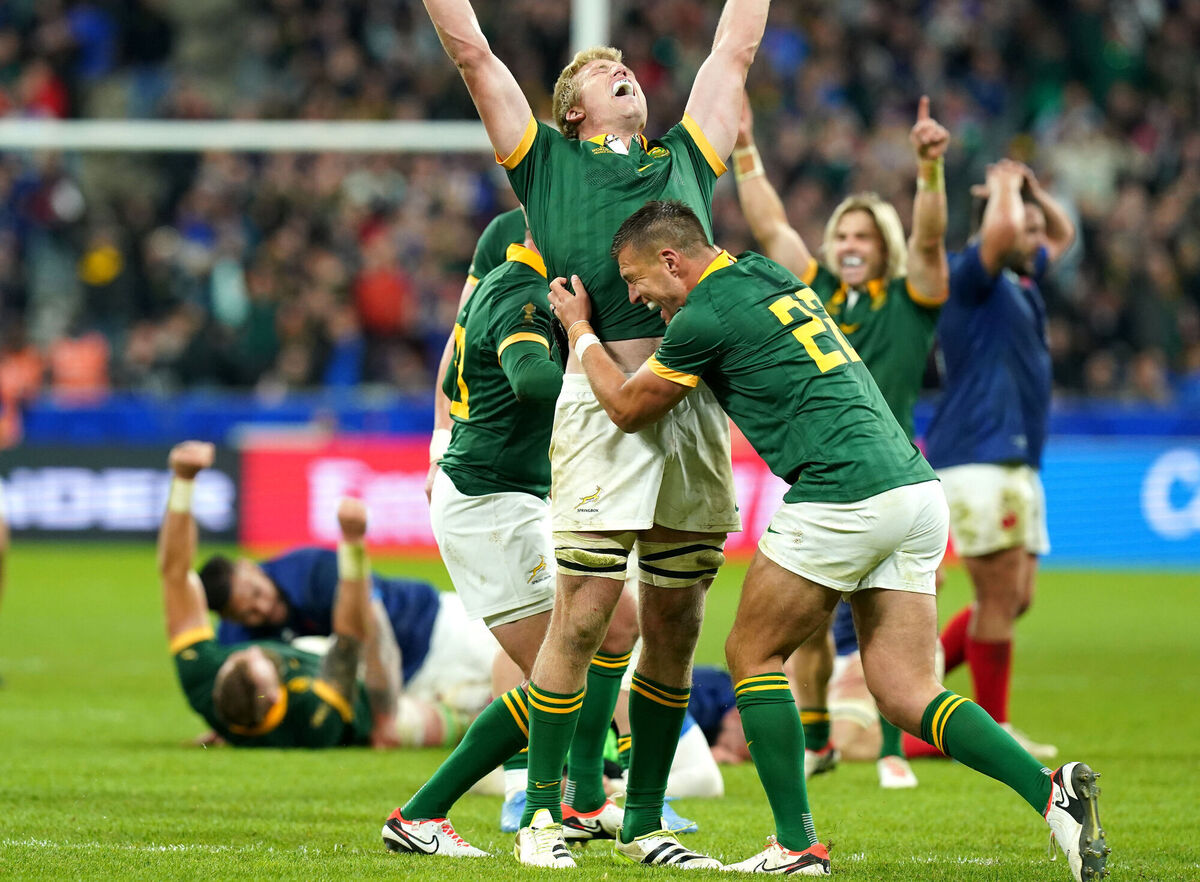South Africa's Pieter-Steph du Toit (centre) celebrates with Handre Pollard (right) and team-mates. Photo credit: Gareth Fuller/PA Wire.