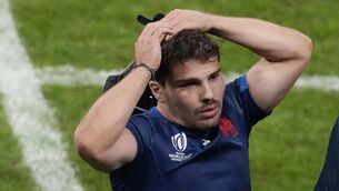<p>France's Antoine Dupont leaves the pitch affter their World Cup quarterfinal loss</p>
