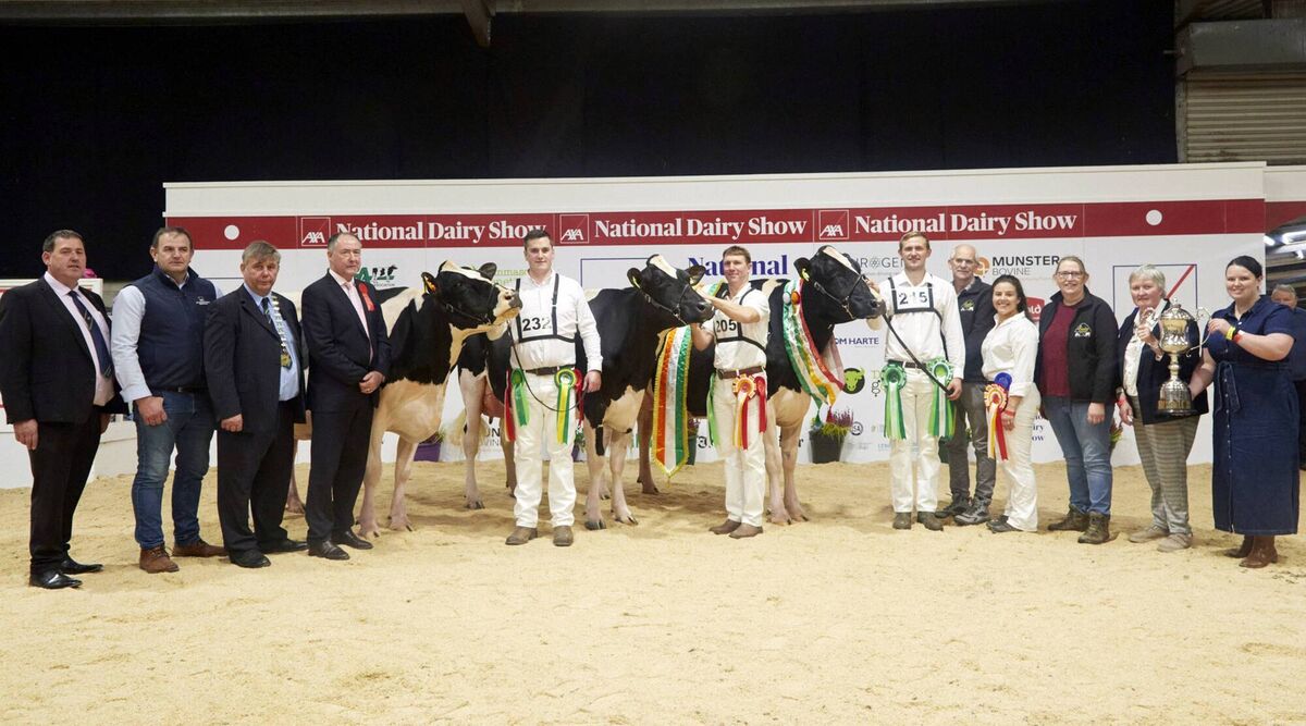 Irish Examiner Supreme Championship final line up at the AXA National Dairy Show 2023. Pictured are: Denis Kiely, Show Director, Tom McCarthy, AXA Farm Insurance, Richard Hamilton, IHFA President, Judge Ashley Fleming, Honorable Mention Cow Eedy Damion Acclaim, owned and bred by Robert, Sylvia, Jason and Laura Helen, handler Brendan Greenan, Philip Jones with Reserve Champion Cow Hallow Diamondback Twizzle 3, owned and bred by Philip and Linda Jones, Jason, Laura, Robert and Sylvia Helen with the 2023 Supreme Champion Cow Eedy Doorman Fame, owned and bred by Robert, Sylvia, Jason and Laura Helen, being presented with the Supreme Champion Cup by Ursula Forrest, Cork Holstein Friesian Breeders Club President and Rachel Martin, Irish Examiner, Sponsor. Photo: Maria Kelly Irish Examiner Supreme Championship final line up at the AXA National Dairy Show 2023. Pictured are: Denis Kiely, Show Director, Tom McCarthy, AXA Farm Insurance, Richard Hamilton, IHFA President, Judge Ashley Fleming, Honorable Mention Cow Eedy Damion Acclaim, owned and bred by Robert, Sylvia, Jason and Laura Helen, handler Brendan Greenan, Philip Jones with Reserve Champion Cow Hallow Diamondback Twizzle 3, owned and bred by Philip and Linda Jones, Jason, Laura, Robert and Sylvia Helen with the 2023 Supreme Champion Cow Eedy Doorman Fame, owned and bred by Robert, Sylvia, Jason and Laura Helen, being presented with the Supreme Champion Cup by Ursula Forrest, Cork Holstein Friesian Breeders Club President and Rachel Martin, Irish Examiner, Sponsor. Photo: Maria Kelly