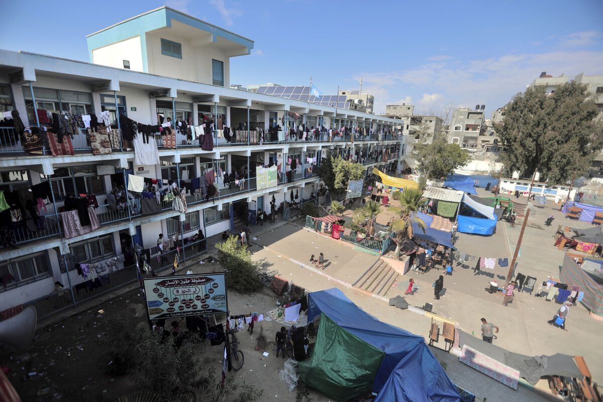 Palestinians take shelter from the Israeli bombardment at a UN, school in Khan Younis in the Gaza Strip, on Monday. Picture: AP Photo/Mohammed Dahman)