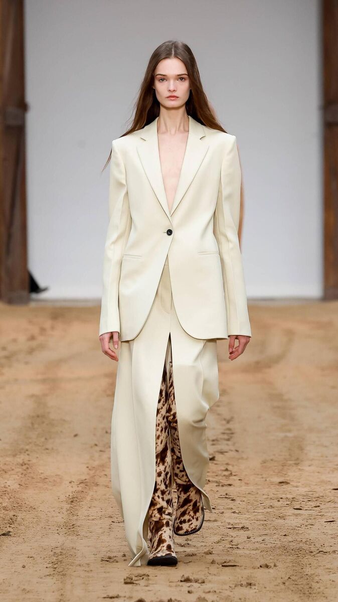 A model walks the runway in a look from Stella McCartney's AW23 runway presentation