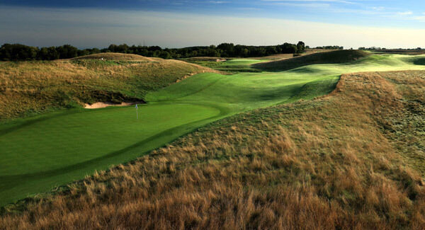 A view from behind the green on the 12th hole at Erin Hills, in Wisconsin. Businessman Bob Lang, who first bought and developed the course at the encouragement of Steve Trattner, was forced to sell at a loss of $10m after cost overruns. Picture: David Cannon A view from behind the green on the 12th hole at Erin Hills, in Wisconsin. Businessman Bob Lang, who first bought and developed the course at the encouragement of Steve Trattner, was forced to sell at a loss of $10m after cost overruns. Picture: David Cannon
