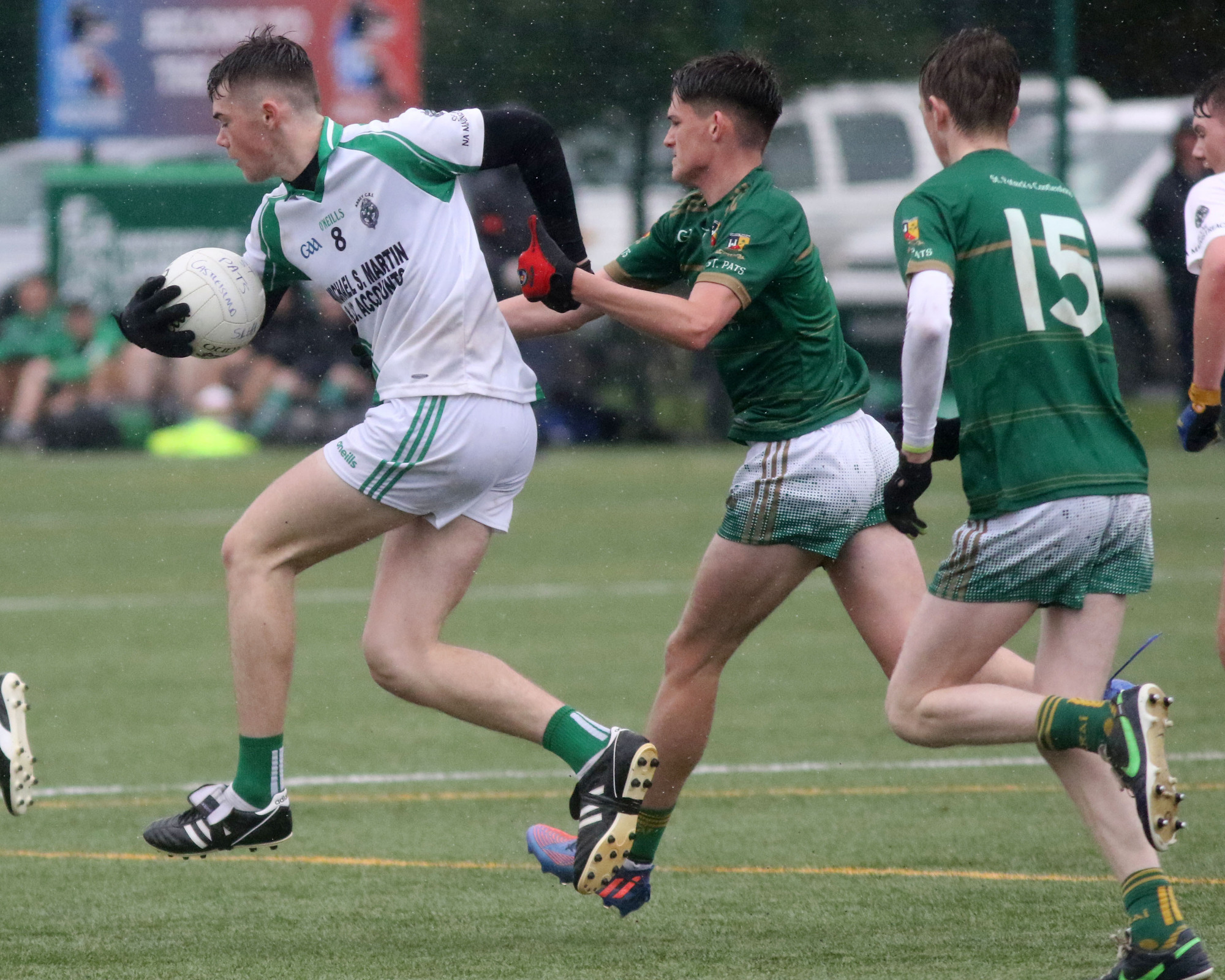 VICTORIOUS: Adam Ryan, Abbey CBS, under pressure from Shane Kelleher and Shane Gilroy, St Pat’s, Castleisland.